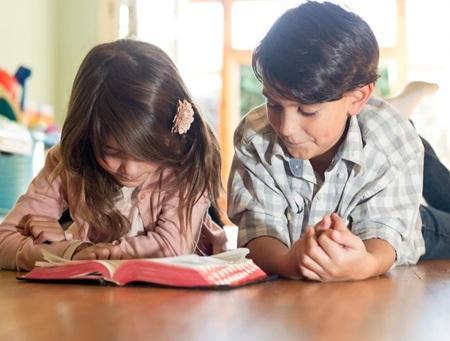 children reading the Bible