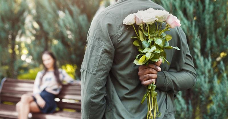 man giving flowers